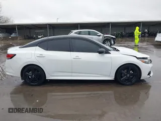 2023 Nissan Sentra SR z VIN 3N1AB8DV4PY277885, wystawiony jako IAAI lot #41553949 z przebiegiem 21 433 mil mil oraz . Historia ofert i sprzedaży dostępna na DreamBid. Obrazek 14.