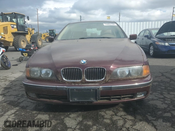 1997 BMW 5 Series 540i z VIN WBADE6320VBW54072, wystawiony jako Copart lot #74403104 z przebiegiem 98 910 mil mil oraz Czysty tytuł • Clean title. Historia ofert i sprzedaży dostępna na DreamBid. Obrazek 5.