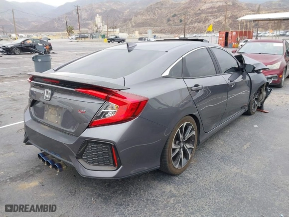 2018 Honda Civic Si Sedan with VIN 2HGFC1E53JH701058, listed as a IAAI auction lot 41457392 with 117,581 mi miles. Bid and sale history available at carsss.com. Image 4.
