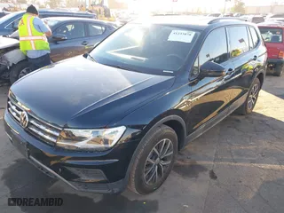 2021 Volkswagen Tiguan S with VIN 3VV1B7AX2MM051166, listed as a IAAI auction lot 41233878 with 28,690 mi miles. Bid and sale history available at carsss.com. Image 17.