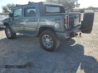 2007 Hummer H2 SUT with VIN 5GRGN22U87H100434, listed as a Copart auction lot 44107995 with 164,089 mi miles and Salvage Title. Bid and sale history available at carsss.com. Image 2.