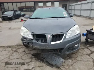 2009 Pontiac G6 GT 1SB z VIN 1G2ZK57K994246920, wystawiony jako Copart lot #85570504 z przebiegiem 127 048 mil mil oraz Czysty tytuł • Clean title. Historia ofert i sprzedaży dostępna na DreamBid. Obrazek 5.