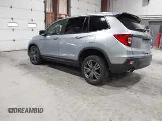 2021 Honda Passport EX-L with VIN 5FNYF8H56MB000107, listed as a IAAI auction lot 41868429 with 66,572 mi miles and . Bid and sale history available at DreamBid. Image 3.