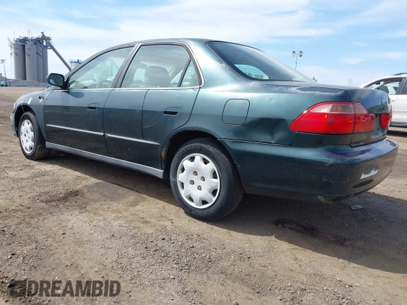 1999 Honda Accord LX with VIN 1HGCG6654XA145126, listed as a IAAI auction lot 42090873 with 76,421 mi miles and . Bid and sale history available at DreamBid. Image 3.