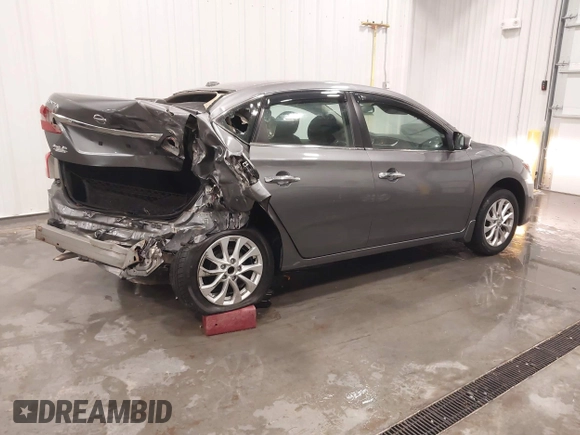 2017 Nissan Sentra S z VIN 3N1AB7AP8HY335577, wystawiony jako IAAI lot #41635102 z przebiegiem 73 361 mil mil oraz . Historia ofert i sprzedaży dostępna na DreamBid. Obrazek 4.