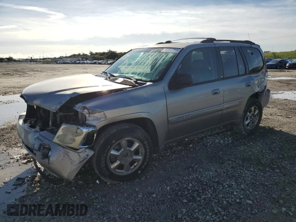 2002 GMC Envoy SLT with VIN 1GKDT13S122491329, listed as a Copart auction lot 75161714 with 149,659 mi miles and Salvage Title. Bid and sale history available at DreamBid. Image 1.