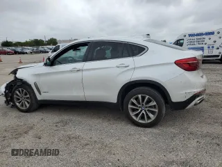 2018 BMW X6 sDrive35i with VIN 5UXKU0C5XJ0G80559, listed as a Copart auction lot 79767994 with 68,731 mi miles and Salvage Title. Bid and sale history available at carsss.com. Image 2.