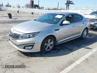 2014 Kia Optima LX with VIN KNAGM4A72E5449984, listed as a IAAI auction lot 41856778 with 1 mi miles. Bid and sale history available at carsss.com. Image 2.
