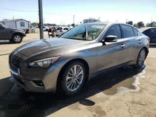 2019 Infiniti Q50 Luxe z VIN JN1EV7AP4KM514928, wystawiony jako Copart lot #56694755 z przebiegiem 63 705 mil mil oraz Szkoda całkowita • Salvage title. Historia ofert i sprzedaży dostępna na DreamBid. Obrazek 1.