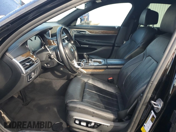2017 BMW 7 Series 740i with VIN WBA7E2C59HG739693, listed as a Copart auction lot 42599835 with 90,061 mi miles and Salvage Title. Bid and sale history available at carsss.com. Image 7.