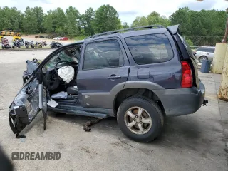 2005 Mazda Tribute S with VIN 4F2CZ06155KM32663, listed as a Copart auction lot 58622554 with 225,000 mi miles and Salvage Title. Bid and sale history available at carsss.com. Image 2.