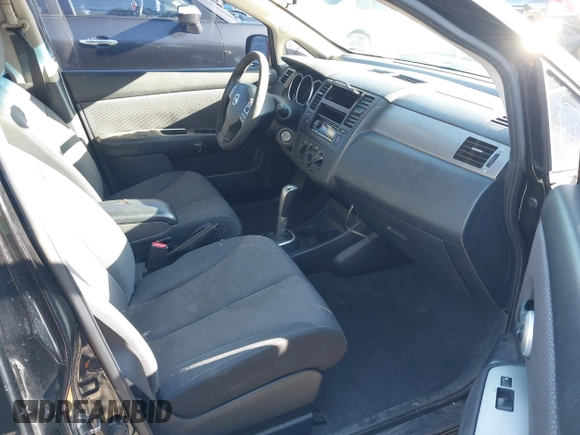 2009 Nissan Versa 1.8 SL with VIN 3N1BC13E59L406937, listed as a IAAI auction lot 41387158 with 149,234 mi miles. Bid and sale history available at carsss.com. Image 5.