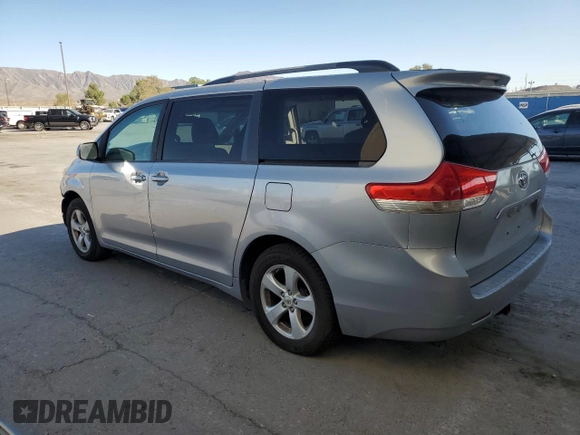 2012 Toyota Sienna LE AAS with VIN 5TDKK3DC8CS259085, listed as a Copart auction lot 73592584 with 198,370 mi miles and Salvage Title. Bid and sale history available at DreamBid. Image 2.