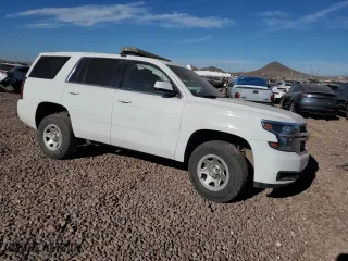 2016 Chevrolet Tahoe Commercial with VIN 1GNSKFEC2GR266027, listed as a Copart auction lot 84628234 with 135,689 mi miles and Salvage Title. Bid and sale history available at carsss.com. Image 4.