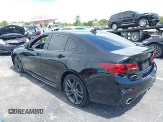 2018 Acura TLX w/A-SPEC Pkg z VIN 19UUB2F65JA002553, wystawiony jako IAAI lot #40023121 z przebiegiem 123 259 mil mil oraz . Historia ofert i sprzedaży dostępna na DreamBid. Obrazek 3.