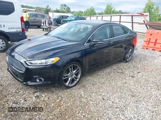2013 Ford Fusion Titanium with VIN 3FA6P0K95DR153437, listed as a IAAI auction lot 42334754 with 139,623 mi miles and . Bid and sale history available at DreamBid. Image 2.