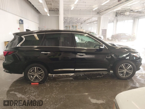 2020 Infiniti QX60 Pure with VIN 5N1DL0MN3LC533814, listed as a IAAI auction lot 41077349 with 79,377 mi miles and . Bid and sale history available at DreamBid. Image 14.