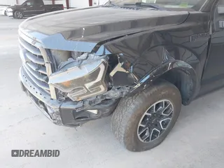 2015 Ford F-150 XLT z VIN 1FTFX1EFXFKE32133, wystawiony jako IAAI lot #42260644 z przebiegiem 136 724 mil mil oraz . Historia ofert i sprzedaży dostępna na DreamBid. Obrazek 6.