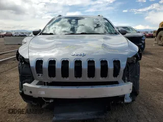 2015 Jeep Cherokee Latitude with VIN 1C4PJMCB6FW734003, listed as a Copart auction lot 54659085 with 146,379 mi miles and Salvage Title. Bid and sale history available at DreamBid. Image 5.