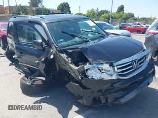 2013 Honda Pilot Touring z VIN 5FNYF3H97DB037141, wystawiony jako IAAI lot #42489479 z przebiegiem 100 630 mil mil oraz . Historia ofert i sprzedaży dostępna na DreamBid. Obrazek 1.