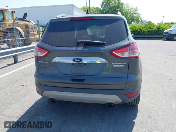 2015 Ford Escape Titanium with VIN 1FMCU0J94FUB24350, listed as a IAAI auction lot 42065641 with 168,215 mi miles. Bid and sale history available at carsss.com. Image 16.