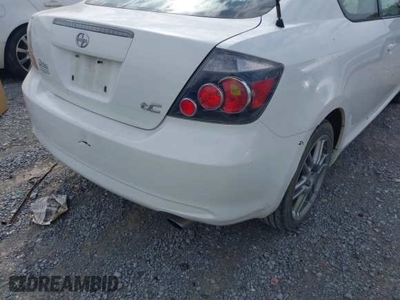 2010 Scion tC with VIN JTKDE3B79A0313508, listed as a IAAI auction lot 41970517 with 163,604 mi miles. Bid and sale history available at carsss.com. Image 12.