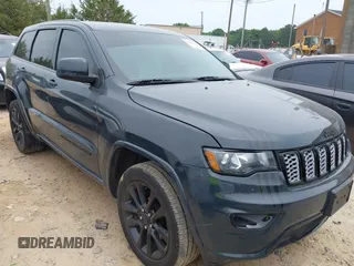 2018 Jeep Grand Cherokee Laredo with VIN 1C4RJFAG4JC303222, listed as a IAAI auction lot 42276244 with 83,585 mi miles and . Bid and sale history available at DreamBid. Image 1.