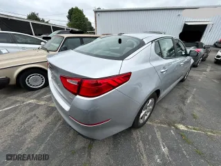 2015 Kia Optima LX with VIN 5XXGM4A71FG465884, listed as a Copart auction lot 54046805 with 114,719 mi miles and Clean Title. Bid and sale history available at carsss.com. Image 4.