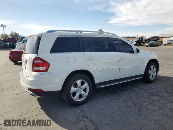 2012 Mercedes-Benz GL 450 z VIN 4JGBF7BE4CA761617, wystawiony jako Copart lot #48529805 z przebiegiem 194 676 mil mil oraz Szkoda całkowita • Salvage title. Historia ofert i sprzedaży dostępna na DreamBid. Obrazek 3.