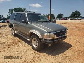 1999 Ford Explorer XLT z VIN 1FMZU32E4XUB76005, wystawiony jako Copart lot #65391564 z przebiegiem 245 873 mil mil oraz Szkoda całkowita • Salvage title. Historia ofert i sprzedaży dostępna na DreamBid. Obrazek 10.