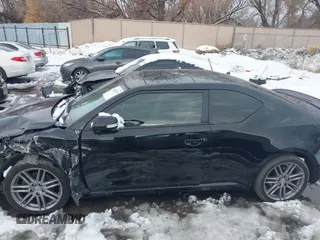 2013 Scion tC with VIN JTKJF5C72D3055801, listed as a IAAI auction lot 41102753 with 242,146 mi miles. Bid and sale history available at carsss.com. Image 14.