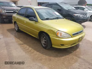 2001 Kia Rio with VIN KNADC123616048085, listed as a IAAI auction lot 42025600 with 123,493 mi miles. Bid and sale history available at carsss.com. Image 1.