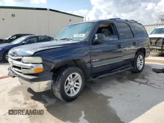 2004 Chevrolet Tahoe LS with VIN 1GNEC13T64R121410, listed as a Copart auction lot 70395744 with 179,973 mi miles and Salvage title. Bid and sale history available at DreamBid. Image 1.