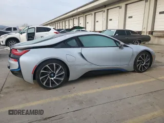 2015 BMW i8 z VIN WBY2Z2C56FV674231, wystawiony jako Copart lot #37218014 z przebiegiem 27 465 mil mil oraz . Historia ofert i sprzedaży dostępna na DreamBid. Obrazek 3.