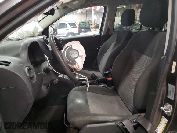 2017 Jeep Compass Sport with VIN 1C4NJCBA9HD146346, listed as a Copart auction lot 52344825 with 144,097 mi miles and Salvage Title. Bid and sale history available at DreamBid. Image 7.