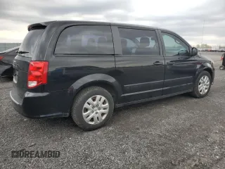 2015 Dodge Grand Caravan SE with VIN 2C4RDGBGXFR744203, listed as a Copart auction lot 54791795 with 216,594 mi miles and Clean Title. Bid and sale history available at DreamBid. Image 3.
