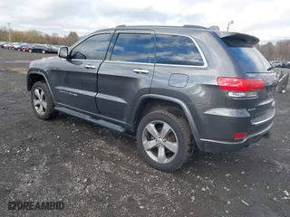 2014 Jeep Grand Cherokee Overland with VIN 1C4RJFCG5EC329377, listed as a IAAI auction lot 40822324 with 106,222 mi miles. Bid and sale history available at carsss.com. Image 3.