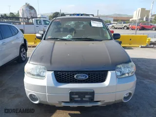 2006 Ford Escape Hybrid with VIN 1FMCU96H76KA56562, listed as a IAAI auction lot 42096713 with 148,963 mi miles. Bid and sale history available at carsss.com. Image 6.