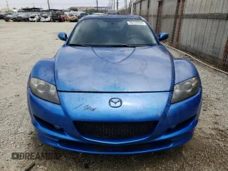 2005 Mazda RX-8 with VIN JM1FE173450144529, listed as a Copart auction lot 56769284 with 0 mi miles and Salvage Title. Bid and sale history available at carsss.com. Image 5.