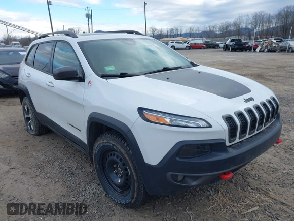 2017 Jeep Cherokee Trailhawk z VIN 1C4PJMBS4HW647835, wystawiony jako IAAI lot #41375077 z przebiegiem 87 208 mil mil oraz . Historia ofert i sprzedaży dostępna na DreamBid. Obrazek 1.