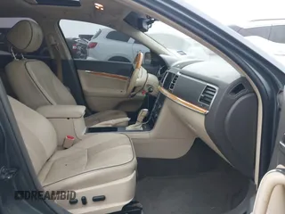 2012 Lincoln MKZ с VIN 3LNHL2GC1CR809142, выставлен на аукционе IAAI как лот 42395593 с пробегом 146 616 миль миль и . История ставок и продаж доступна на DreamBid. Изображение 5.