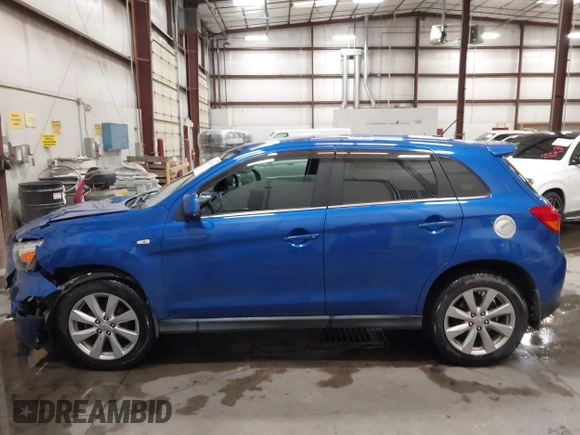 2015 Mitsubishi Outlander SE with VIN 4A4AR4AU1FE054804, listed as a IAAI auction lot 42325699 with 106,680 mi miles and . Bid and sale history available at DreamBid. Image 14.