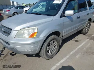2003 Honda Pilot EX with VIN 2HKYF18443H571688, listed as a IAAI auction lot 42097297 with 313,910 mi miles. Bid and sale history available at carsss.com. Image 16.
