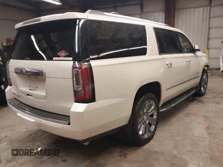 2015 GMC Yukon XL Denali with VIN 1GKS2JKJ1FR635901, listed as a IAAI auction lot 41805739 with 120,998 mi miles and . Bid and sale history available at carsss.com. Image 4.