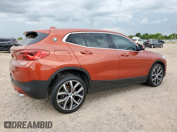 2018 BMW X2 sDrive28i with VIN WBXYJ3C37JEJ75893, listed as a Copart auction lot 62513565 with 62,029 mi miles and Salvage title. Bid and sale history available at DreamBid. Image 3.