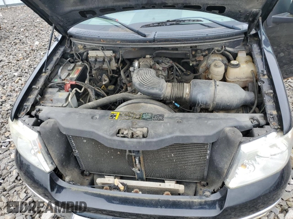 2004 Ford F-150 XL with VIN 1FTRF14WX4NA87425, listed as a Copart auction lot 59962415 with 123,301 mi miles and Clean title. Bid and sale history available at DreamBid. Image 11.