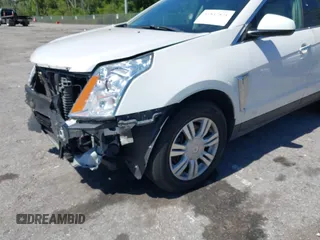 2016 Cadillac SRX Luxury Collection z VIN 3GYFNEE34GS513728, wystawiony jako IAAI lot #41847871 z przebiegiem 109 045 mil mil oraz . Historia ofert i sprzedaży dostępna na DreamBid. Obrazek 17.