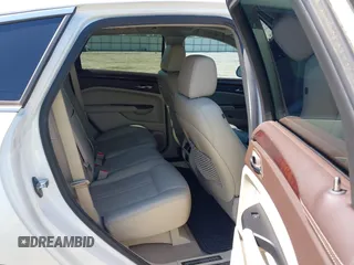 2013 Cadillac SRX Performance Collection with VIN 3GYFNDE34DS530275, listed as a IAAI auction lot 42148040 with 244,929 mi miles. Bid and sale history available at carsss.com. Image 8.