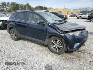 2018 Toyota RAV4 XLE with VIN JTMWFREV6JJ735000, listed as a Copart auction lot 45869275 with 113,675 mi miles and Salvage Title. Bid and sale history available at DreamBid. Image 4.