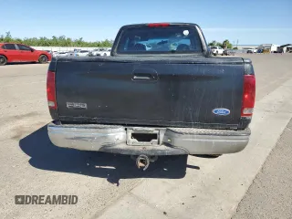 1999 Ford F-150 with VIN 1FTZX1726XKB49687, listed as a Copart auction lot 56416455 with 240,196 mi miles and Salvage title. Bid and sale history available at DreamBid. Image 6.